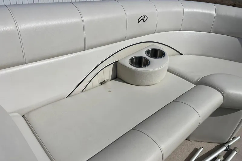 Slide: The Image of Luxurious seating with cup holders on 2015 Avalon Catalina Cruise 23' boat. - 49