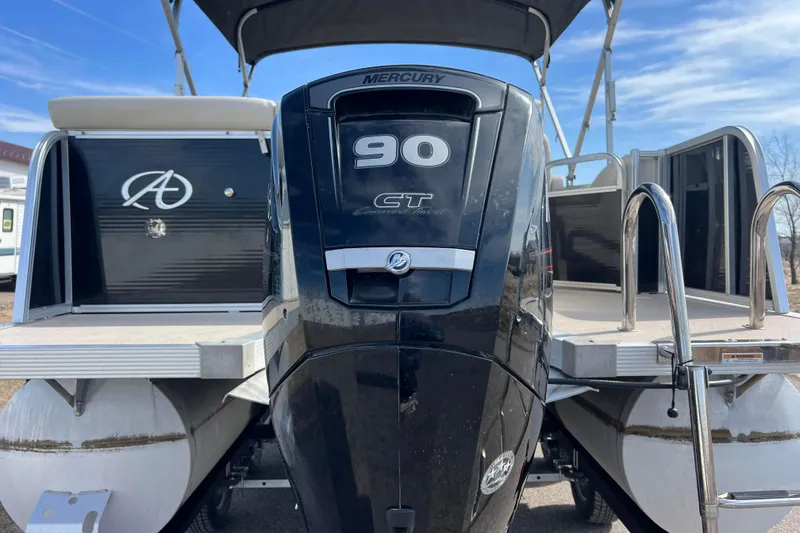 Slide: The Image of 2015 Avalon Catalina Cruise boat with Mercury 90 CT engine, rear view. - 6