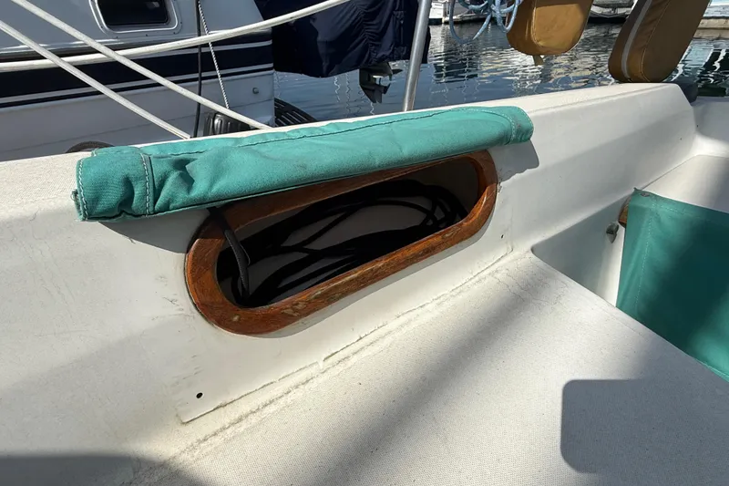 Slide: The Image of Catalina 36 sailboat cockpit detail with teal canvas cover, 1987 model. - 12