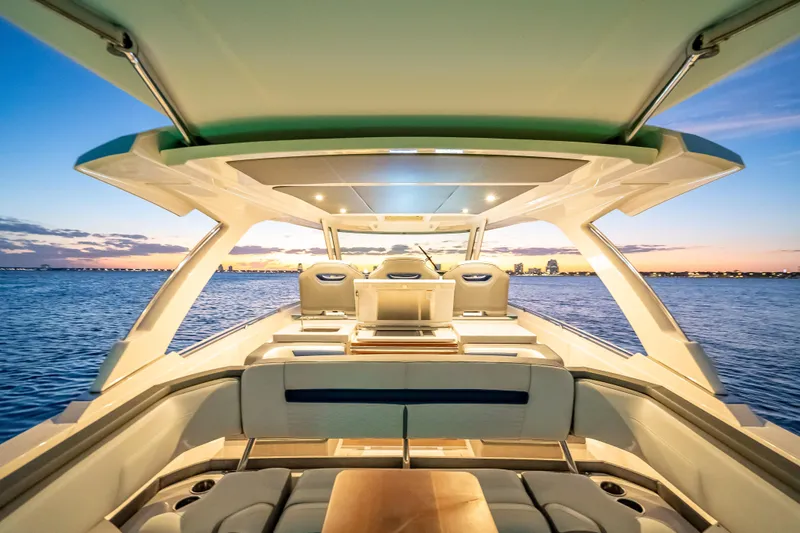 Slide: The Image of Luxurious 2019 Tiara Yachts 38 LS interior with sunset ocean view. - 30