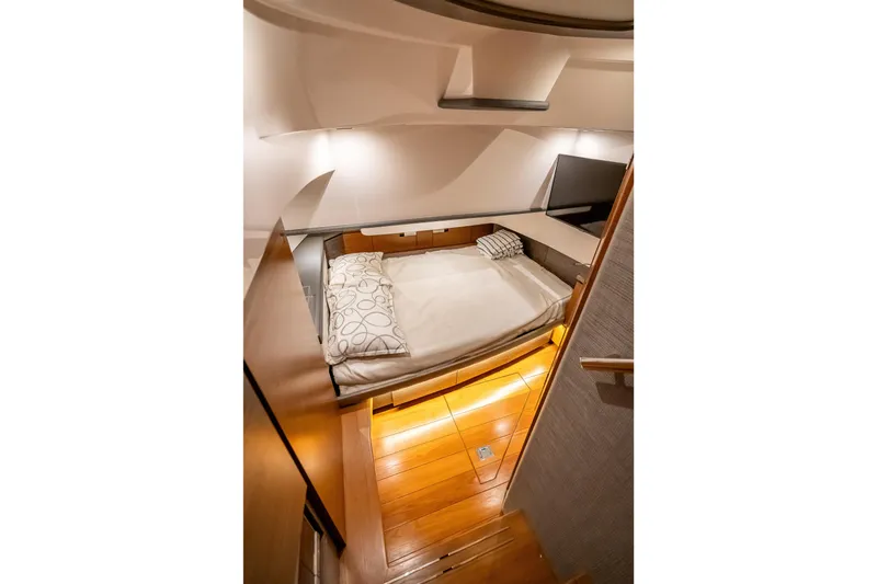 Slide: The Image of Luxurious cabin interior of 2019 Tiara Yachts 38 LS with cozy bed and modern design. - 34