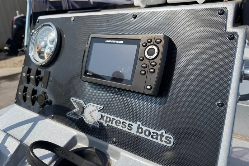 Slide: The Image of Dashboard of 2024 Xpress H190B Bay boat with Humminbird fish finder. - 8
