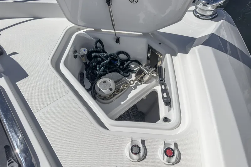 Slide: The Image of An anchor locker on a boat with chains and ropes. - 35