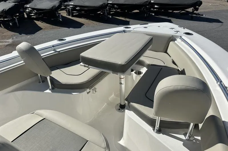 Slide: The Image of Interior of 2026 Key West 219 FS boat with seating and table setup. - 10