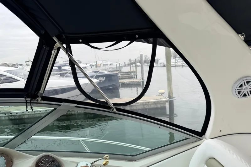 Slide: The Image of Interior view of a 2007 Sea Ray Sundancer 320 at a marina. - 17