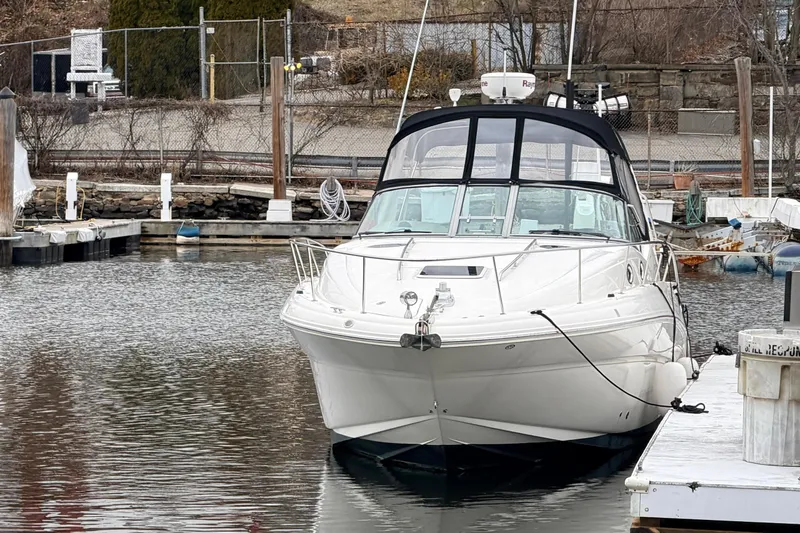 Slide: The Image of 2007 Sea Ray Sundancer 320 yacht docked in a marina. - 3