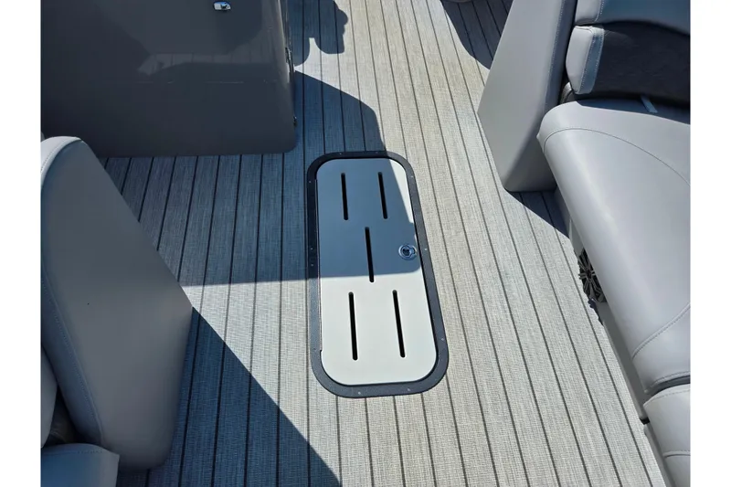 Slide: The Image of 2018 Misty Harbor 2585 Biscayne Bay CU boat interior with sleek flooring and seating. - 13