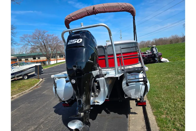 Slide: The Image of 2018 Misty Harbor 2585 Biscayne Bay CU pontoon boat with powerful outboard motor. - 2