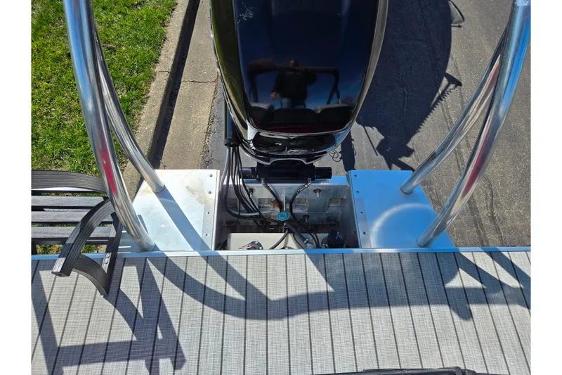 Slide: The Image of 2018 Misty Harbor 2585 Biscayne Bay CU boat engine and deck view. - 20