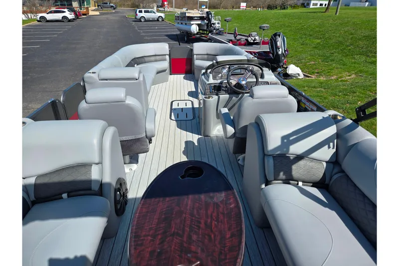 Slide: The Image of 2018 Misty Harbor 2585 Biscayne Bay CU pontoon boat with spacious seating and modern dashboard. - 22