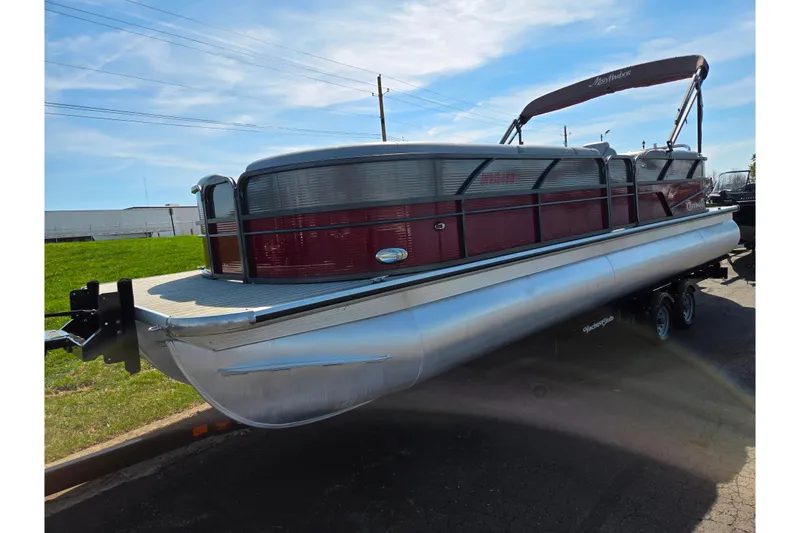 Slide: The Image of 2018 Misty Harbor 2585 Biscayne Bay CU pontoon boat on trailer, sunny day. - 5