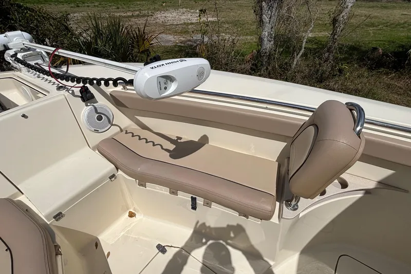 Slide: The Image of Interior of 2016 Scout 255 LXF boat with seating and Minn Kota trolling motor. - 26