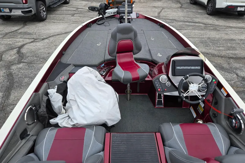 Slide: The Image of 2018 Ranger Z520 Comanche Cup-Equipped boat interior with Humminbird electronics and red-gray seating. - 11