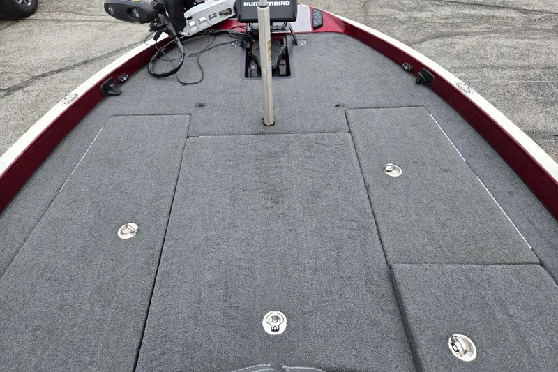 Slide: The Image of 2018 Ranger Z520 Comanche Cup-Equipped boat deck with storage compartments and fishing equipment. - 16