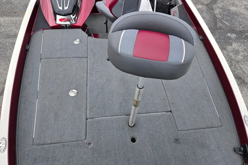 Slide: The Image of 2018 Ranger Z520 Comanche boat deck with gray carpet and red-accented seat. - 19
