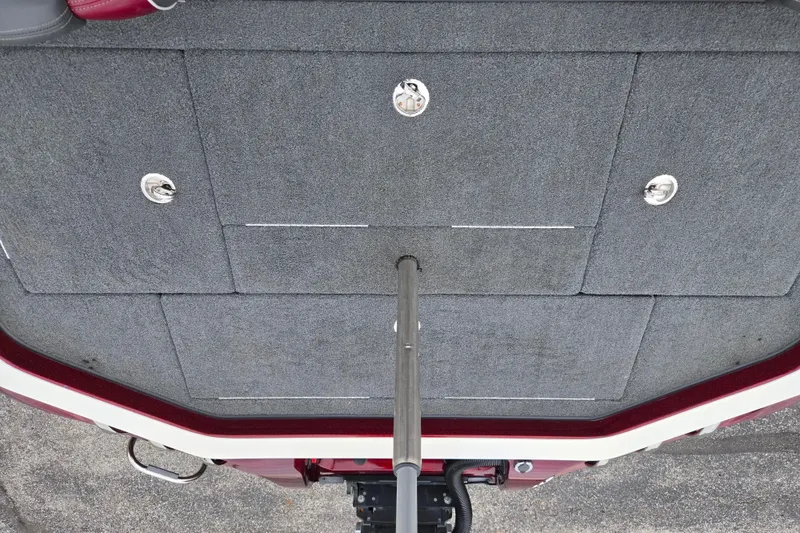 Slide: The Image of 2018 Ranger Z520 Comanche Cup-Equipped boat deck with storage compartments and carpeted surface. - 23