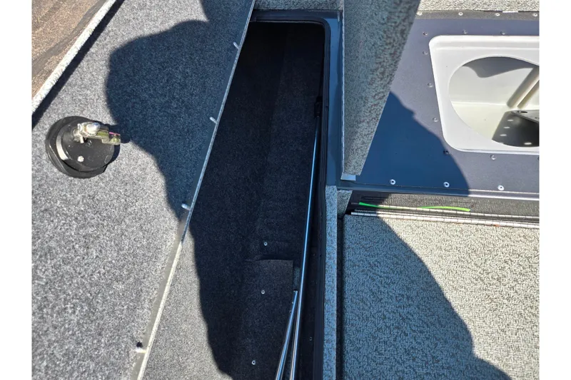 Slide: The Image of Interior view of 2021 G3 Sportsman 1810 boat storage compartment. - 17