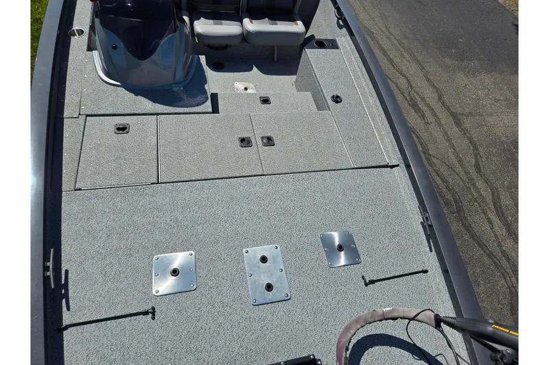 Slide: The Image of 2021 G3 Sportsman 1810 boat deck with seating and storage compartments. - 21