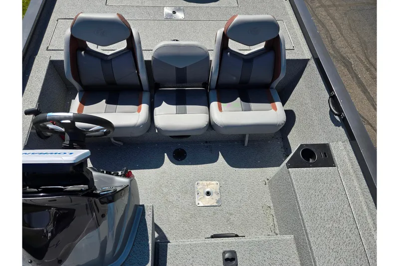Slide: The Image of 2021 G3 Sportsman 1810 boat interior with three gray seats and steering console. - 23