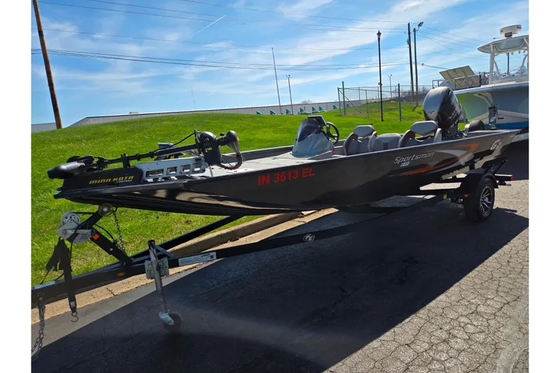 Slide: The Image of 2021 G3 Sportsman 1810 boat on trailer, parked outdoors under clear sky. - 5