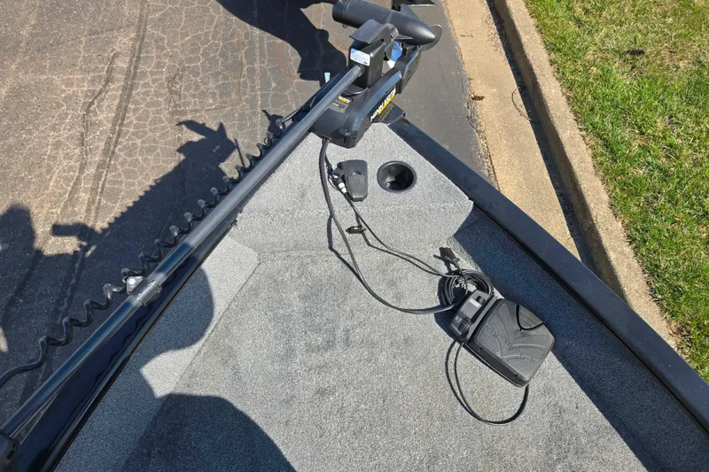 Slide: The Image of 2024 Tracker Pro Guide V-16 WT boat deck with trolling motor and foot pedal. - 19