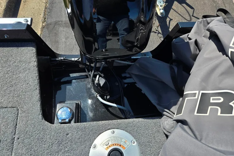 Slide: The Image of 2024 Tracker Pro Guide V-16 WT boat interior with motor and cover details. - 27