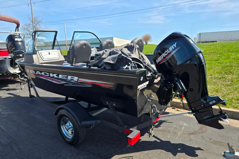 Slide: The Image of 2024 Tracker Pro Guide V-16 WT boat with Mercury engine on trailer. - 3