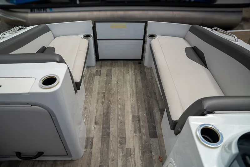 Slide: The Image of Interior of a 2018 Crest Calypso 190 SL boat with gray seating. - 4