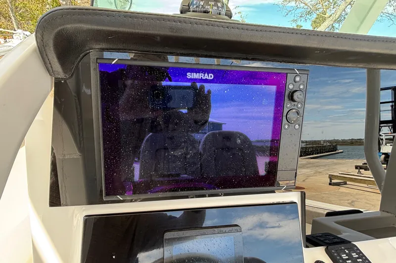 Slide: The Image of Simrad display on 2023 Sea Pro 239 Deep V CC boat, dockside view. - 15