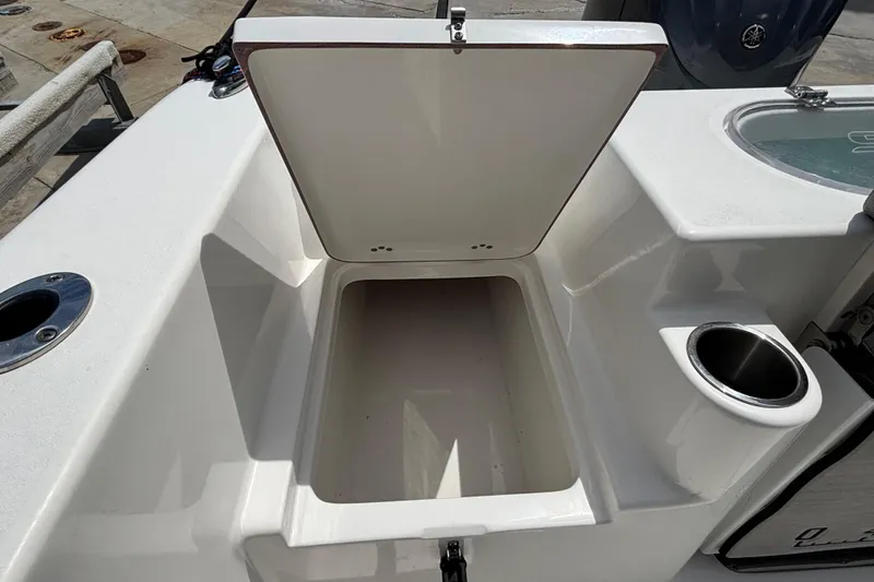 Slide: The Image of Open storage compartment on 2023 Sea Pro 239 Deep V CC boat deck. - 3