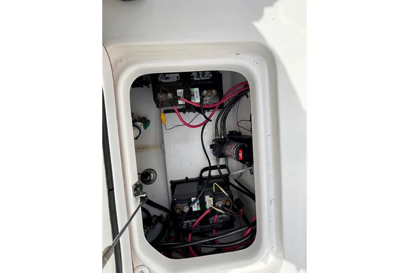Slide: The Image of Electrical compartment of 2023 Sea Pro 239 Deep V CC boat with wiring and components. - 4