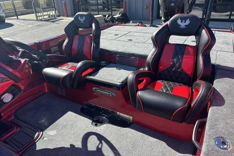 Slide: The Image of 2026 Phoenix 20 XE boat interior with red and black seats, showcasing modern design. - 10