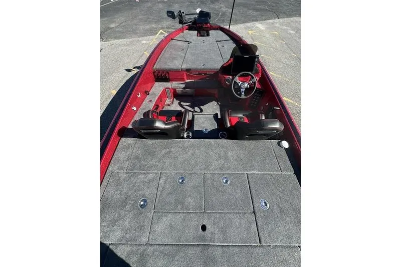 Slide: The Image of 2026 Phoenix 20 XE boat interior with red accents and modern dashboard. - 12