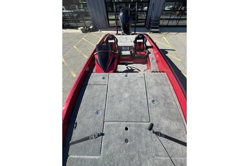 Slide: The Image of 2026 Phoenix 20 XE boat interior with red accents and dual seats. - 13