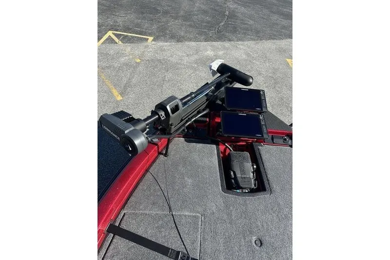 Slide: The Image of 2026 Phoenix 20 XE boat deck with advanced navigation equipment and dual screens. - 14