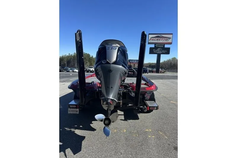 Slide: The Image of Rear view of a 2026 Phoenix 20 XE boat with powerful outboard motor. - 7