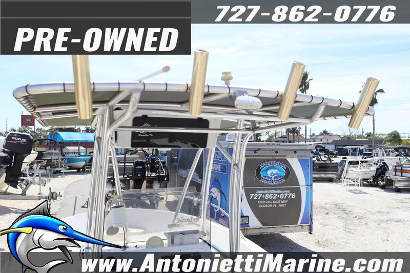 Slide: The Image of Pre-owned 2004 Aquasport 205 Osprey boat displayed at Antonietti Marine dealership. - 22