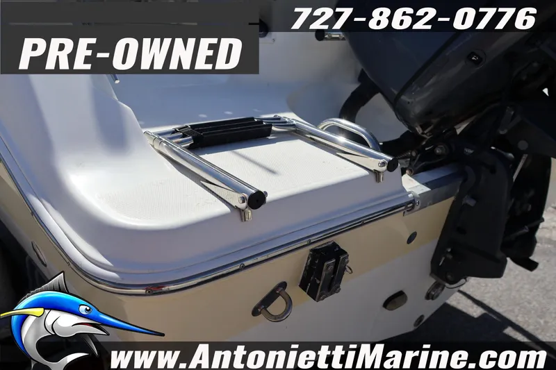Slide: The Image of Pre-owned 2004 Aquasport 205 Osprey boat with ladder, contact Antonietti Marine. - 6