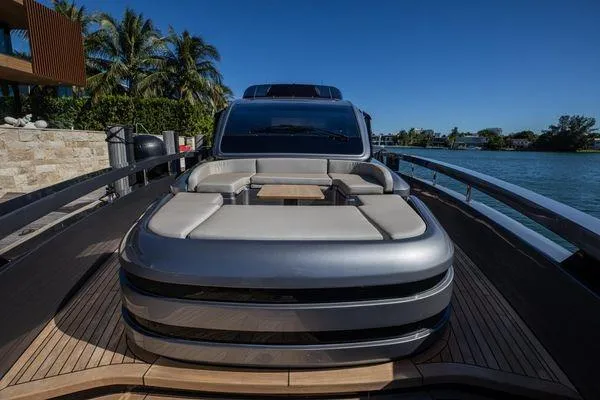 Slide: The Image of Luxurious 2025 Pershing GTX 80 yacht with sleek design and spacious deck seating. - 11