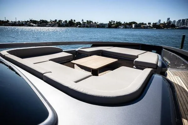 Slide: The Image of Luxurious seating area on 2025 Pershing GTX 80 yacht with ocean view. - 14