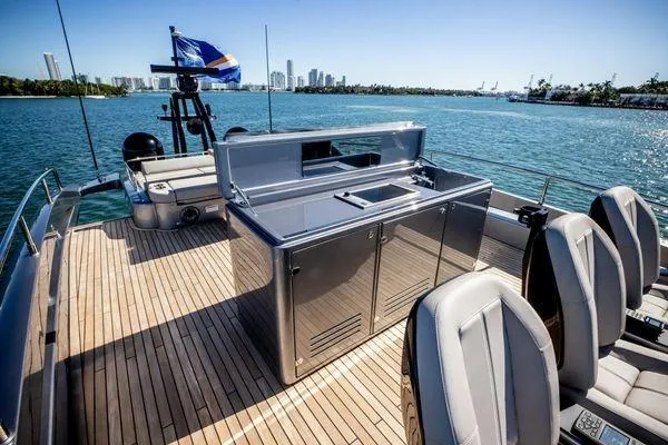 Slide: The Image of Luxury yacht Pershing GTX 80 deck with sleek outdoor kitchen, ocean view, 2025 model. - 19