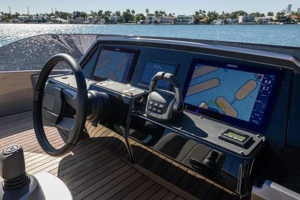 Slide: The Image of Cockpit of 2025 Pershing GTX 80 yacht with advanced navigation displays. - 22