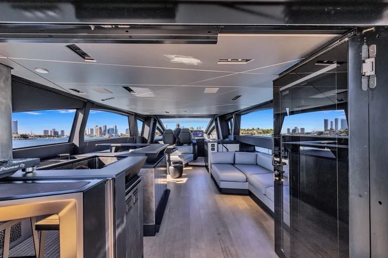 Slide: The Image of Luxurious interior of 2025 Pershing GTX 80 yacht with modern design and city skyline view. - 24
