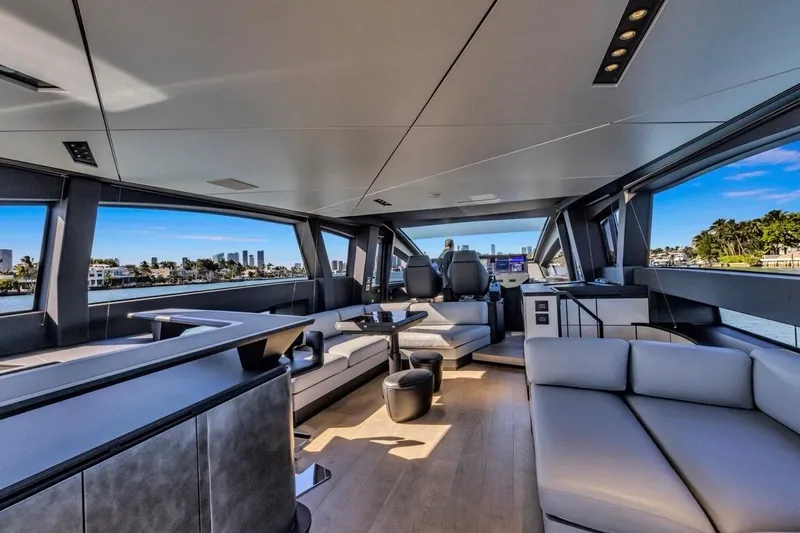 Slide: The Image of Luxurious interior of 2025 Pershing GTX 80 yacht with modern furnishings and panoramic windows. - 30