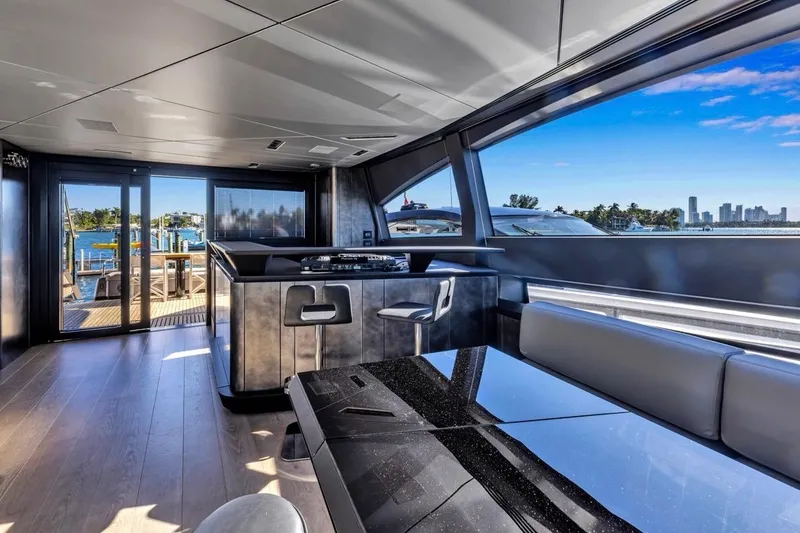 Slide: The Image of Luxurious interior of 2025 Pershing GTX 80 yacht with panoramic windows and modern design. - 31