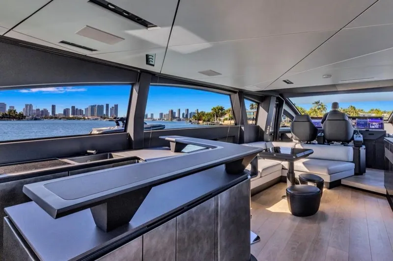 Slide: The Image of Luxurious interior of 2025 Pershing GTX 80 yacht with city skyline view. - 32