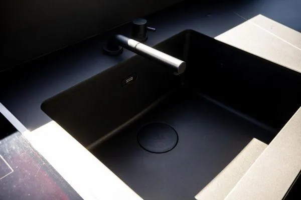Slide: The Image of Modern black kitchen sink with sleek faucet, Pershing GTX 80, 2025. - 36
