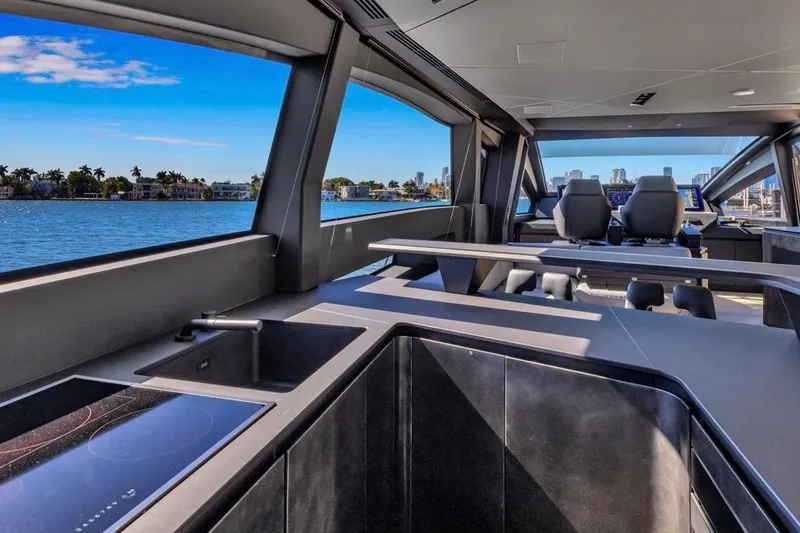 Slide: The Image of Luxurious interior of 2025 Pershing GTX 80 yacht with modern kitchen and scenic ocean view. - 37