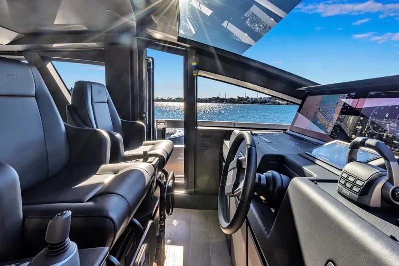 Slide: The Image of Luxurious interior of 2025 Pershing GTX 80 yacht with modern navigation system. - 44