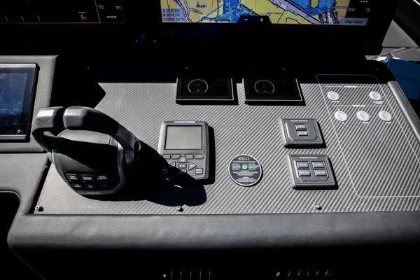 Slide: The Image of Control console of the 2025 Pershing GTX 80 yacht. - 48